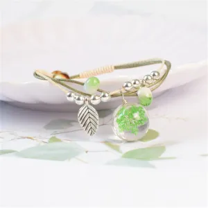 Ceramics & Green Gypsophila Resin Bell Charm Bracelet