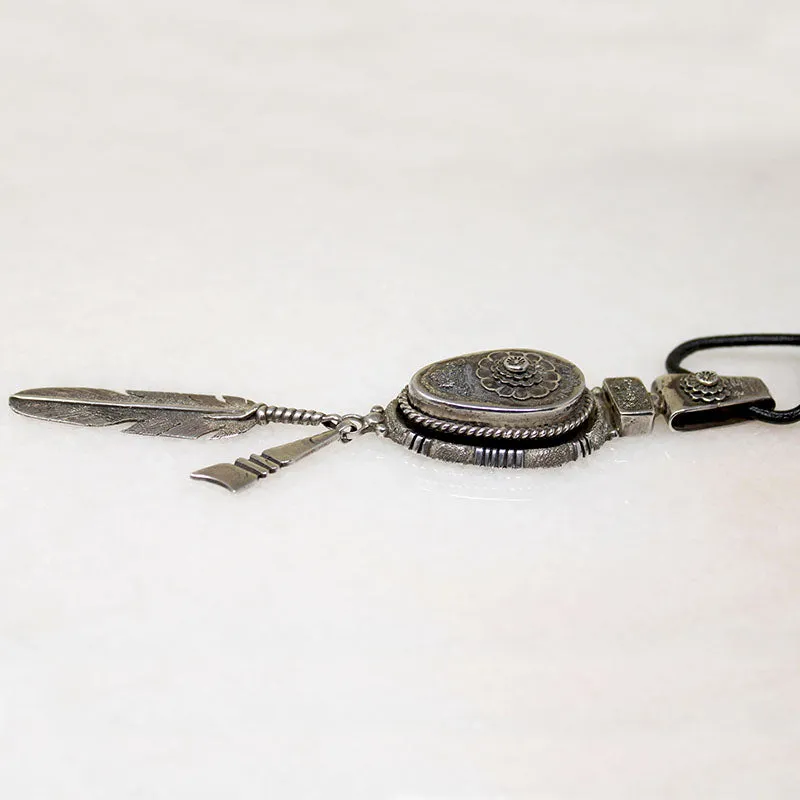 Feather & Flowers Sterling Pendant by B. Begaye