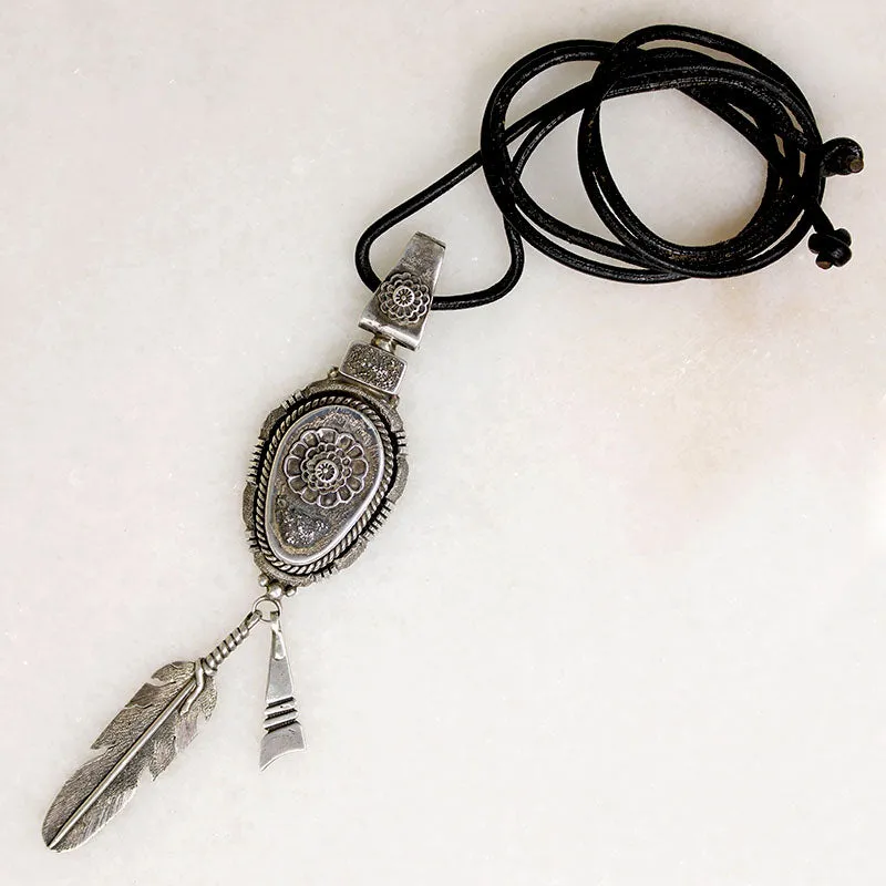 Feather & Flowers Sterling Pendant by B. Begaye